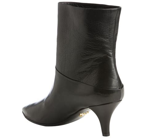 prada black leather pointed toe boots|Prada genuine leather boots.